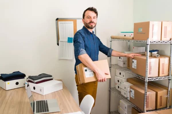 Man beside boxes